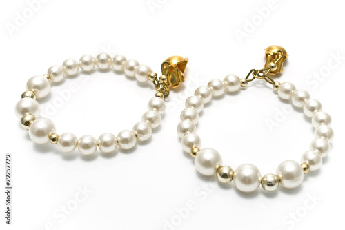 Pearl earrings isolated on white © gavran333