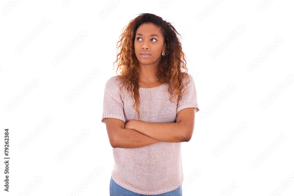 Portrait of a thoughtful young african american woman with cross Portrait of a thoughtful young african american woman with cross