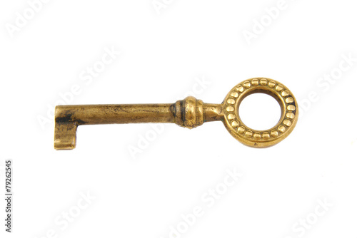 Single old golden key on a white background