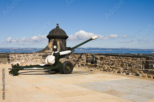 Edinburgh castle gun in sunny day