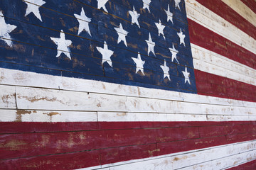 Painted American flag onn wooden wall