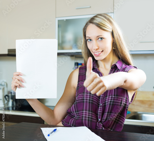 Smiling woman with documents