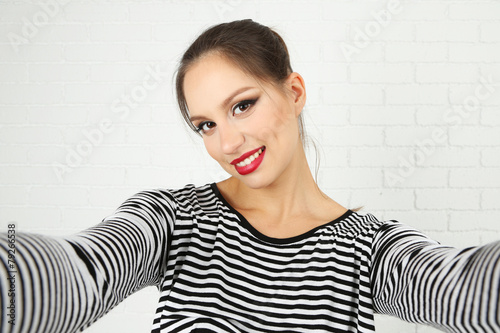 Beautiful stylish girl maki...