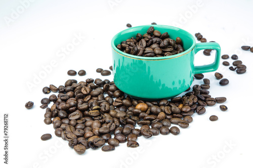 Coffee beans in coffee cup