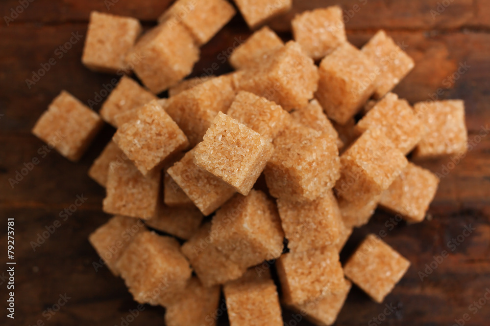 sugar cane cubes closeup wooden table shallow DOF