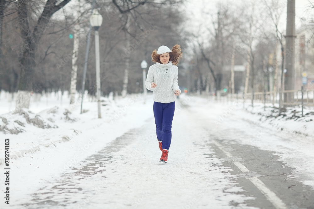 sports running girl in winter sweater sports running girl in winter sweater