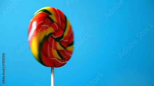 lollipop in the form of an round on a blue background