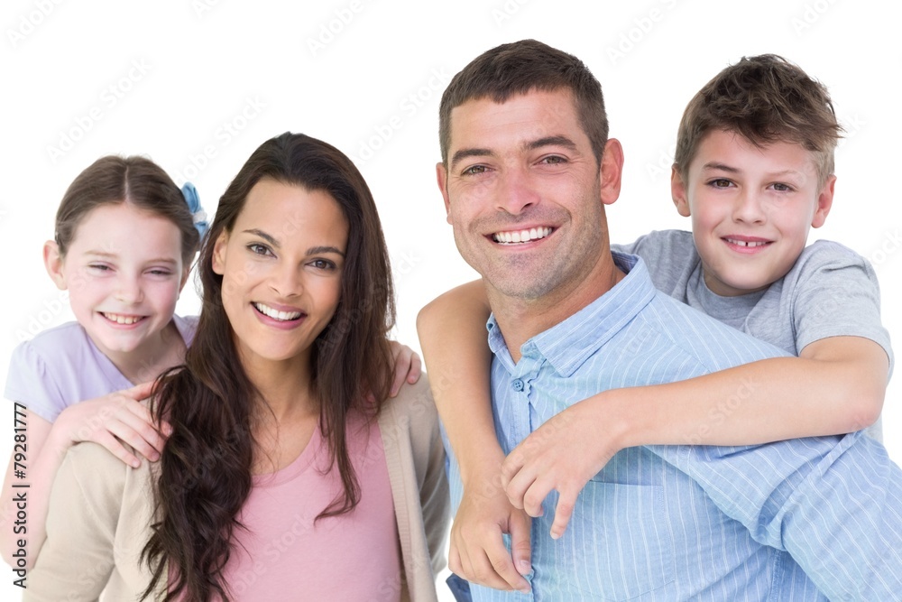 Portrait of parents giving piggyback ride to children Portrait of parents giving piggyback ride to children