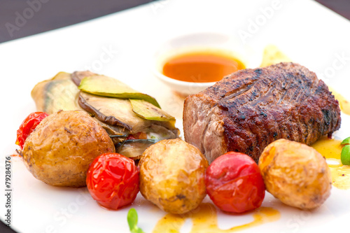 Prime grilled juicy beef steak with roasted vegetables