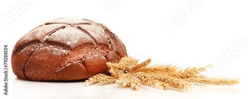 Fresh bread with wheat isolated on white
