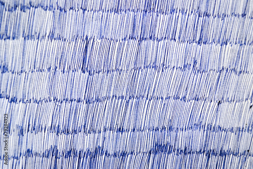Blue ballpoint pen on white paper, texture or background