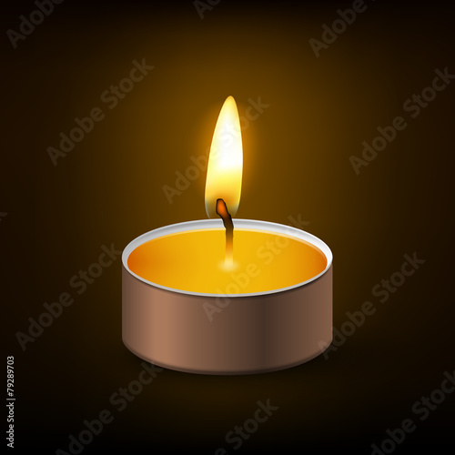 Tea light close-up on a dark background