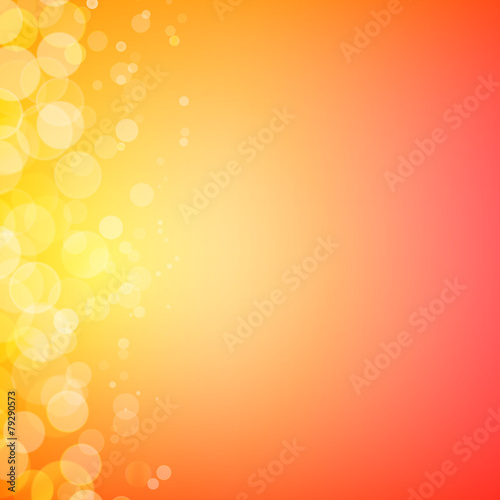 Abstract bokeh sparkles on sunny blurred background