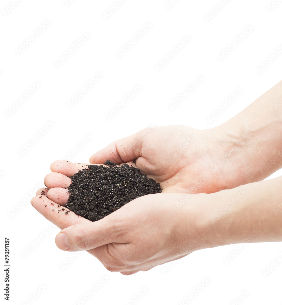 ground in human hands isolated on white background ground in human hands isolated on white background