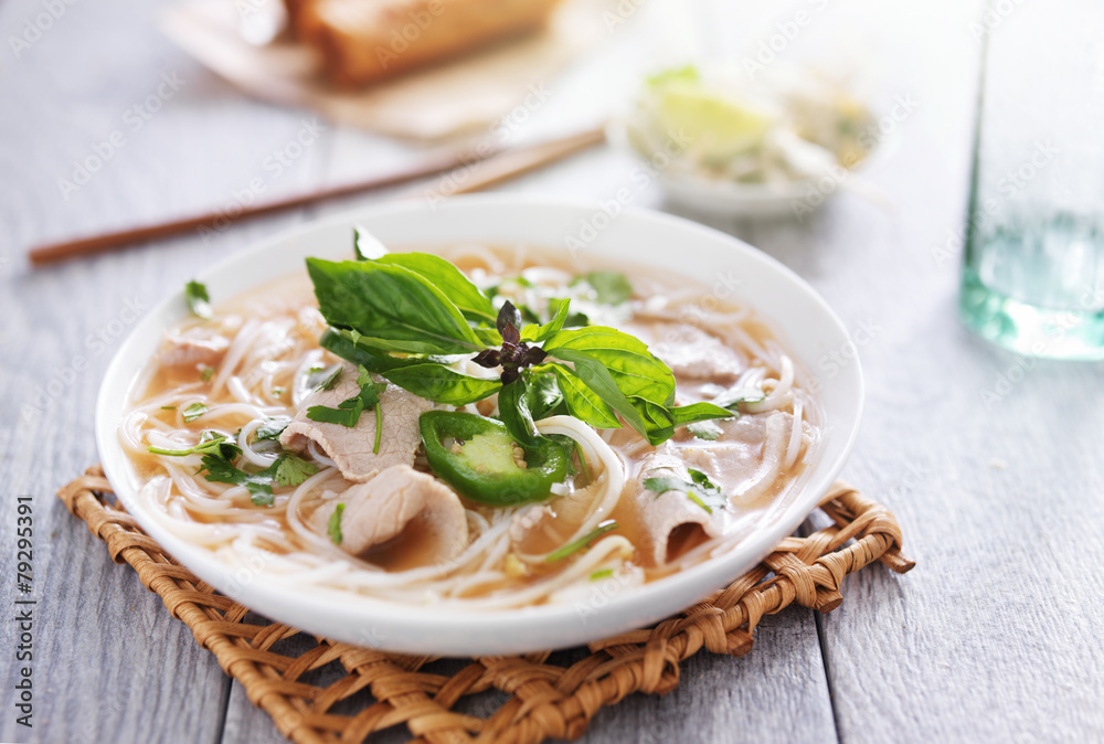 vietnamese pho soup dish with sliced beef and cilantro vietnamese pho soup dish with sliced beef and cilantro