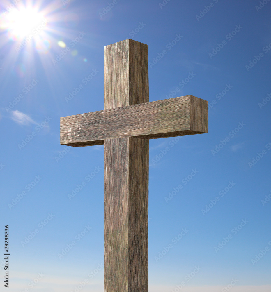 Ostern, Holzkreuz vor blauem Himmel mit Sonne Ostern, Holzkreuz vor blauem Himmel mit Sonne