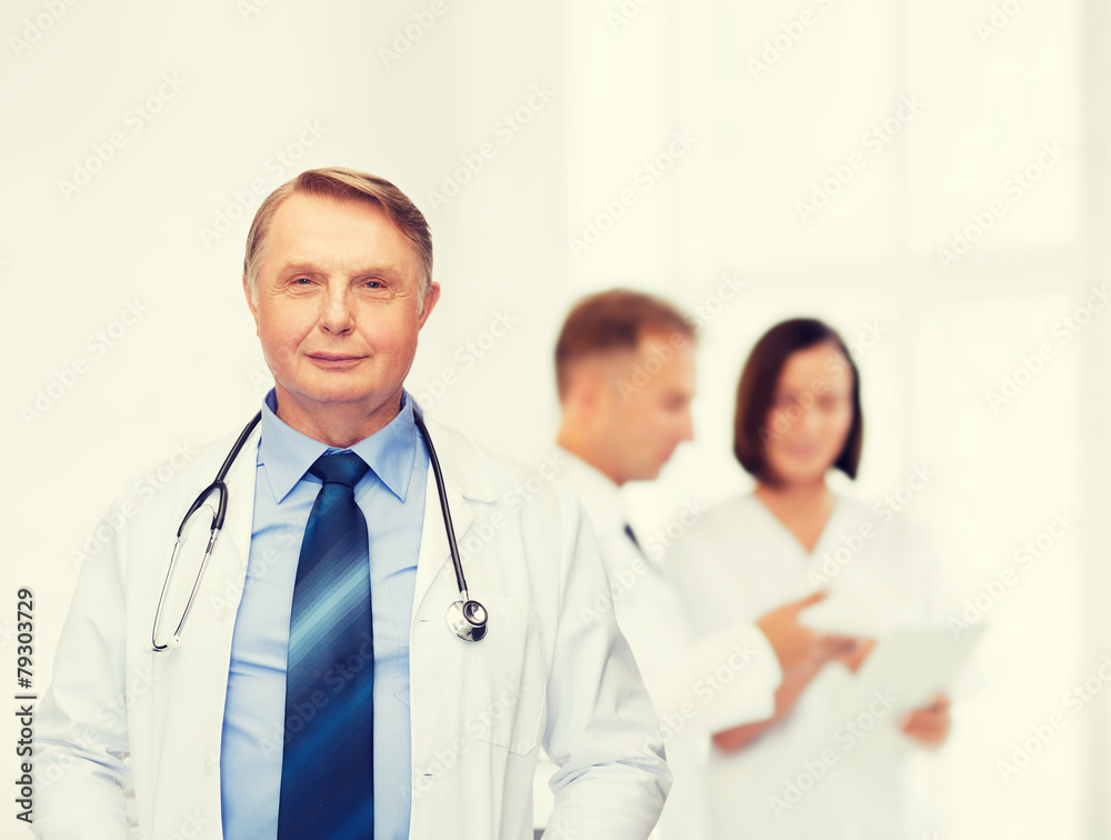 smiling doctor or professor with stethoscope smiling doctor or professor with stethoscope