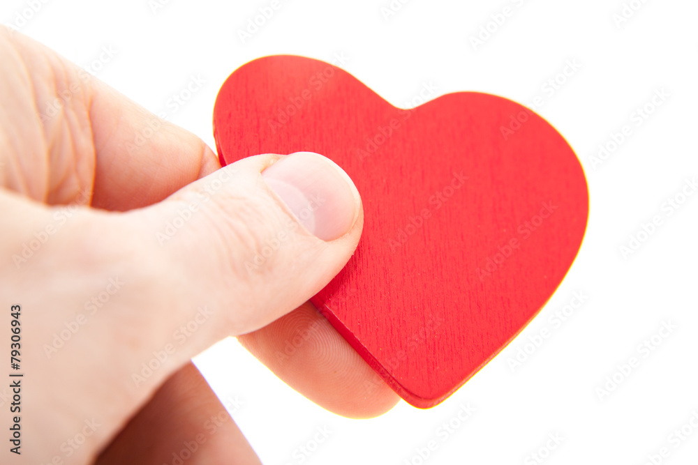 Hand holding red heart. All on white background. Hand holding red heart. All on white background.