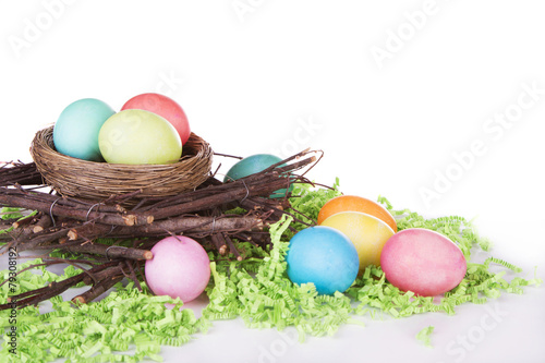 Dyed Easter eggs in a nest