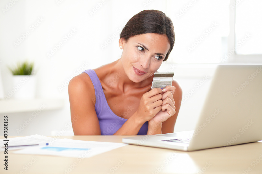 Happy woman paying with electronic wallet Happy woman paying with electronic wallet