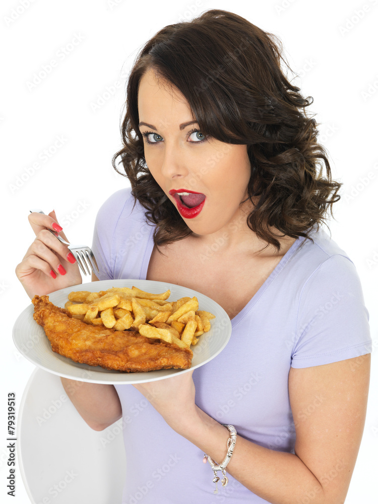 Young Woman Eating Traditional Fish and Chips Young Woman Eating Traditional Fish and Chips