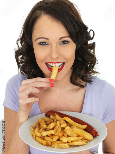 Young Woman Eating Saveloy and Chips