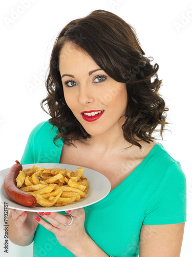 Young Woman Eating Saveloy Sausage and Chips