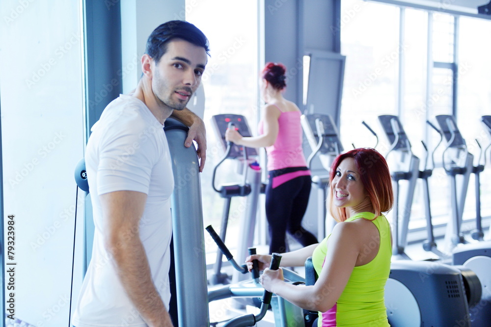 Fototapeta premium woman exercising with her personal trainer