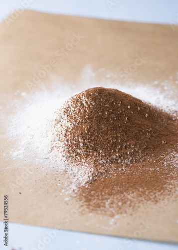 Heap of wheat flour and cocoa powder