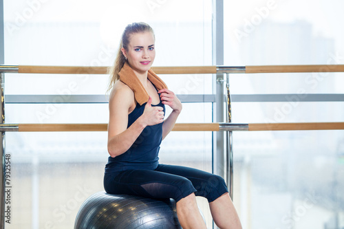 Beautiful young woman girl after physical excercise in fitness