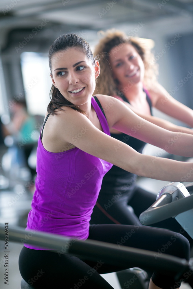 Group of people running on treadmills Group of people running on treadmills