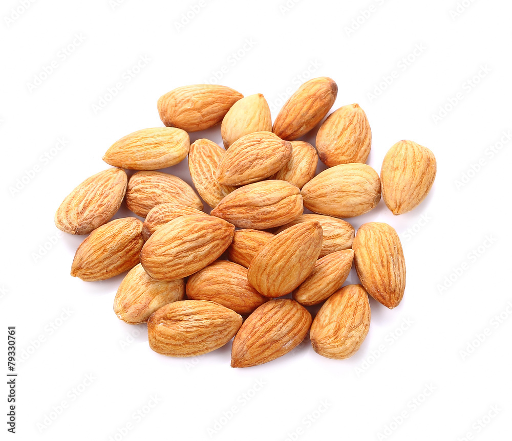 Heap of almond nuts isolated on white background Heap of almond nuts isolated on white background