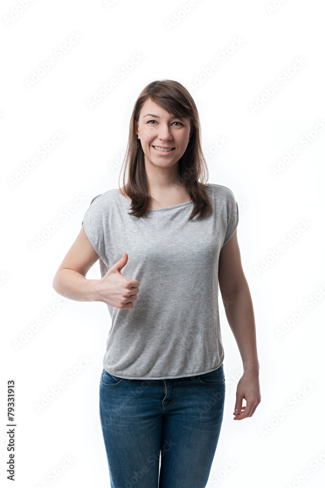 Young woman showing thumbs up Young woman showing thumbs up