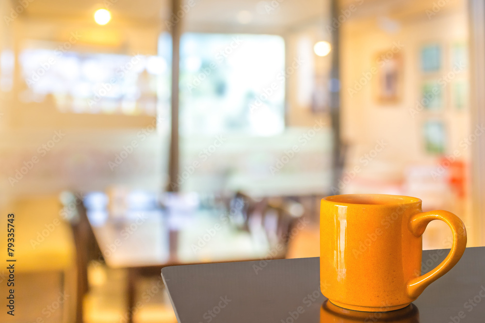 Empty wood table and Coffee shop blur background with bokeh imag