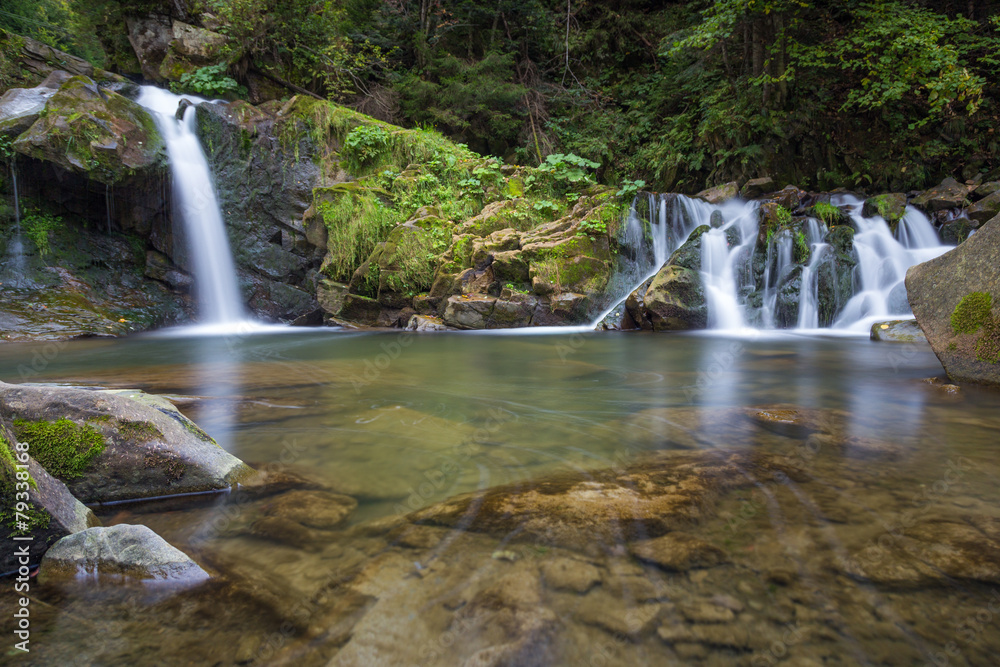 Obraz premium Beautiful waterfall in forest