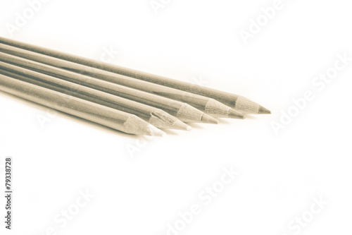 colored pencils in white background