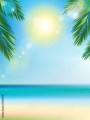 Summer time at the beach with coconut leaf on top vertical