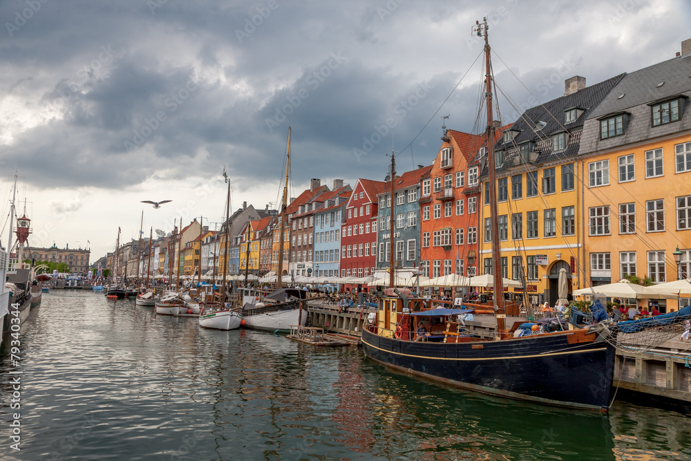The boats and ships in the calm hurbour of Nyhavn, Copenhagen