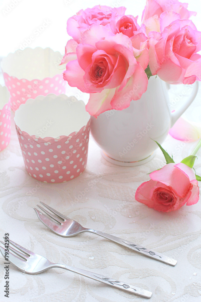 Beautiful romantic pink roses in a white vase
