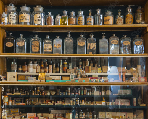 Empty scent bottles in old pharmacy photo