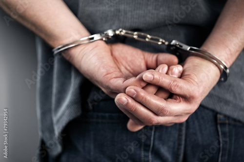 Fotobehang Criminal in handcuffs