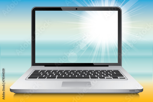 Laptop with summer landscape in background