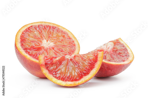 ripe blood red oranges sliced isolated on white