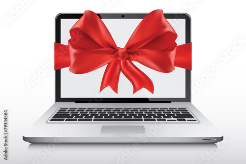 Laptop as a gift with bow on screen