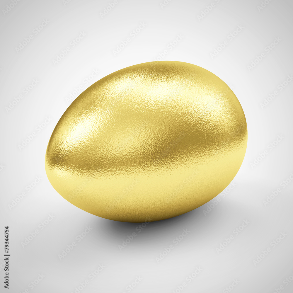 Easter Concept. Big Golden Egg on gradient background Easter Concept. Big Golden Egg on gradient background