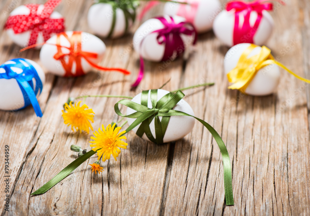 easter eggs with varicolored ribbons