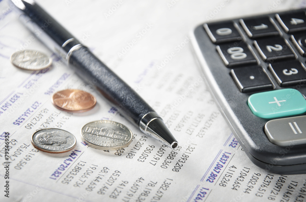 Calculator, pen, coins, and paper Calculator, pen, coins, and paper