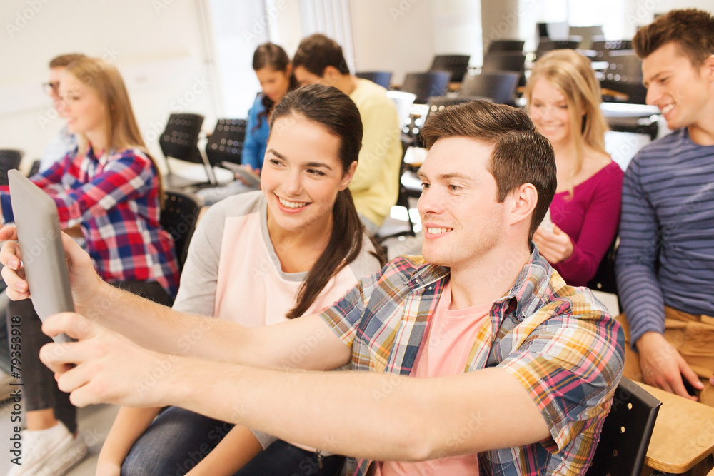 group of smiling students with tablet pc group of smiling students with tablet pc