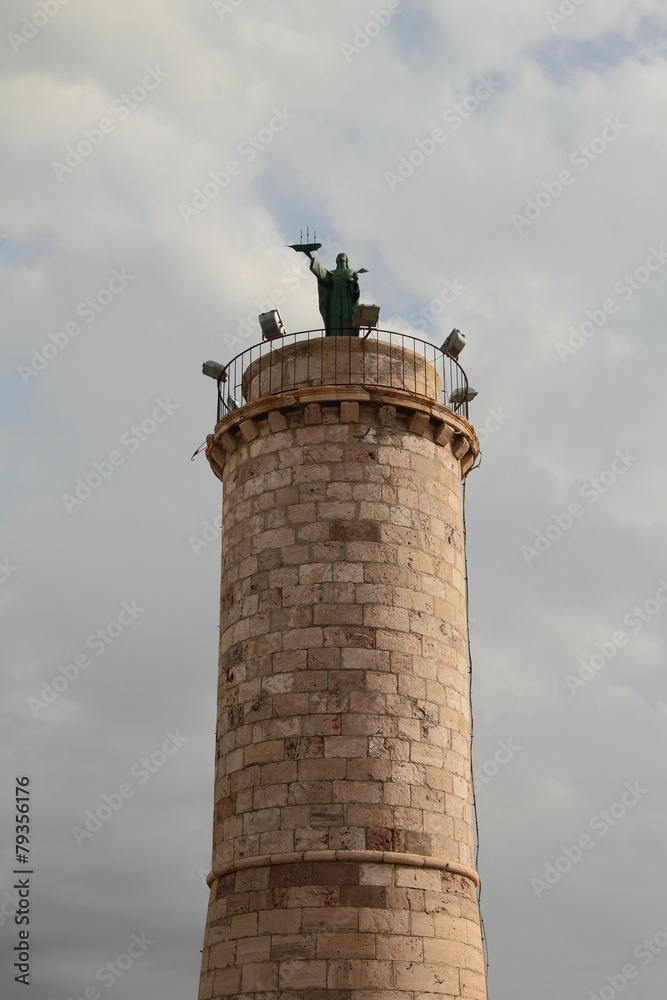 Column with Saint Fermina statue. Civitavecchia, Italy Column with Saint Fermina statue. Civitavecchia, Italy