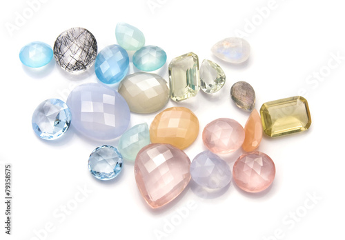 Pastel color gemstones collection on the white background.
